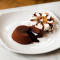Dolce Tuscia Dark Chocolate Souffle Served With Ice Cream
