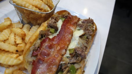 Cnc Loaded Philly Cheesesteak W/ Fries And Can Drink