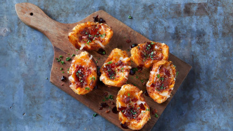 Pieles De Patata Glaseadas Con Whisky Y Tocino