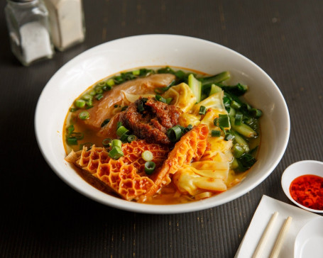 Spicy Tendon, Tripe, And Wonton Satay Noodle Soup