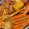 C1. 1/2 Lb Snow Crab Legs, 1/2 Lb Shrimp (No Head), 1/2 Lb All-Meat Sausage, 1 Boiled Egg, 1 Corn 1 Potato