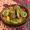 Tagine lam met artisjok en doperwtjes