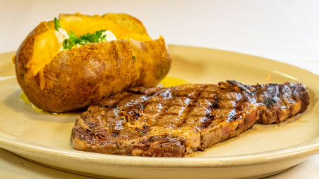 Ribeye Hand Cut Grilled To Perfection With Baked Potato