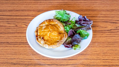 Handmade Shortcrust Minced Beef And Onion Pie In A Thick Beef Gravy