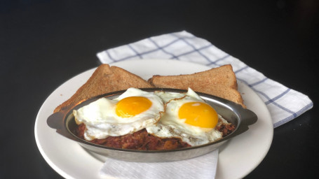 Amphora’s Signature Corned Beef Hash And Eggs