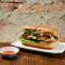 yuè shì fǎ bāo sān wén zhì pèi xiāng kǎo zhū bā D4. Sandwich with sliced grilled pork chop