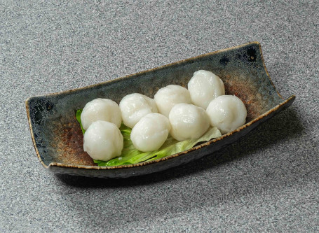 Shǒu Dǎ Mò Yú Wán Hand Beaten Cuttlefish Balls Bàn Fèn Half)