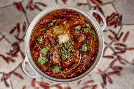 Our Spice-Infused Broth With Sirloin Beef Shuǐ Zhǔ Xī Lěng Niú Ròu