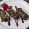 Rollos De Baklawa De Nueces Bañados En Chocolate (3)