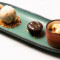 Café Gourmand : Mousse Chocolat Blanc, Pomme Caramel Isigny, Glace Vanille Macadamia, Fondant Choco