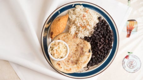 #10. Pupusa Of Your Choice, One Pastelito, Rice And Choice Of Beans Or Yucca Boiled Or Fried
