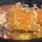 4. 2 Chicken Enchiladas, Topped With Sour Cream, And 1 Beef Taco