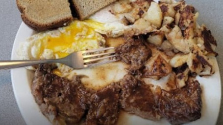 Eggs 2 , Ny Strip Steak, Home Fries Toast